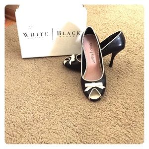 Two-tone peep toe heels with bow detail