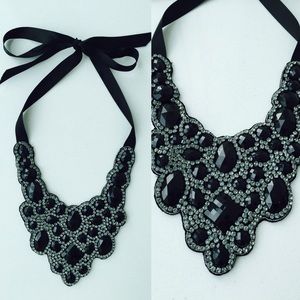 Black and crystal bib necklace.
