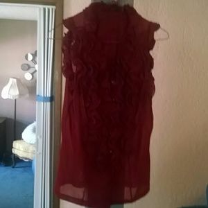 Sleeveless blood red ruffled blouse