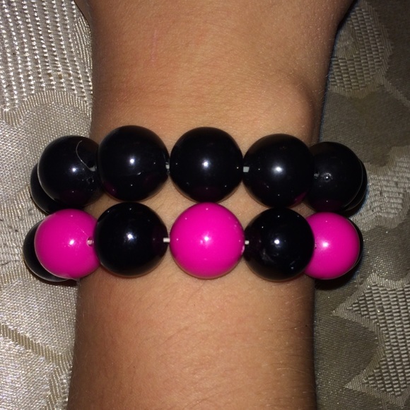 Black and pink round bead bracelets