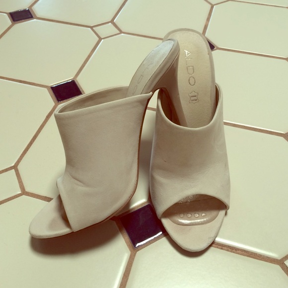 This is a listing for two pairs of Aldo shoes