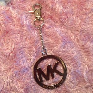 A MK purse charm