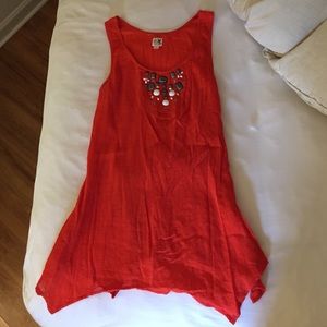 Anthro orange tank with embellishments on chest