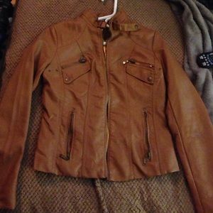 Tan leather jacket with lemon silk lining