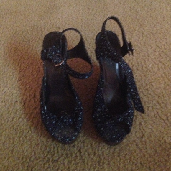 Size 7 heels. Dark blue floral print
