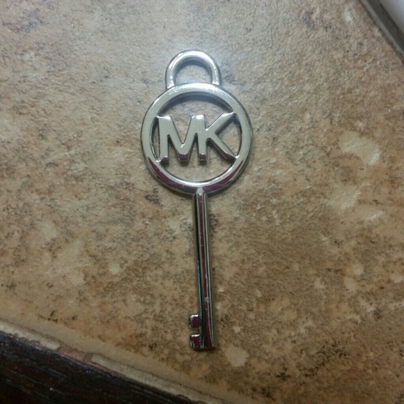 Michael Kors silver key