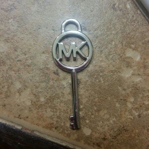 Michael Kors silver key