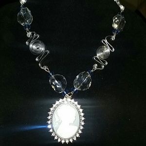 Necklace with metal work and beads