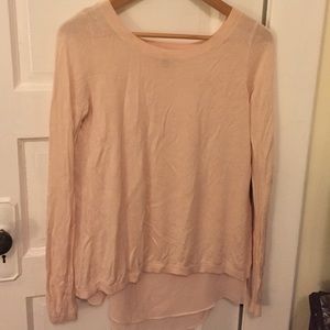 Light pink sweater with split back