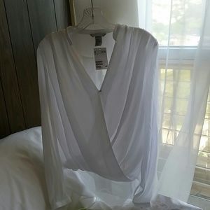 White flowy v-neck tunic