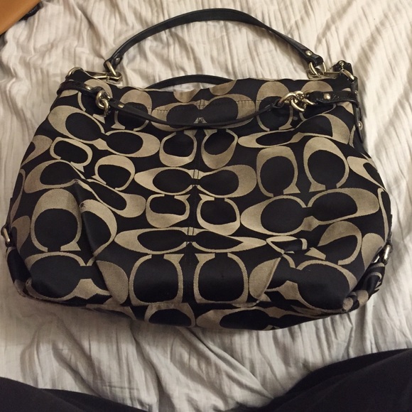 Black and gray coach purse