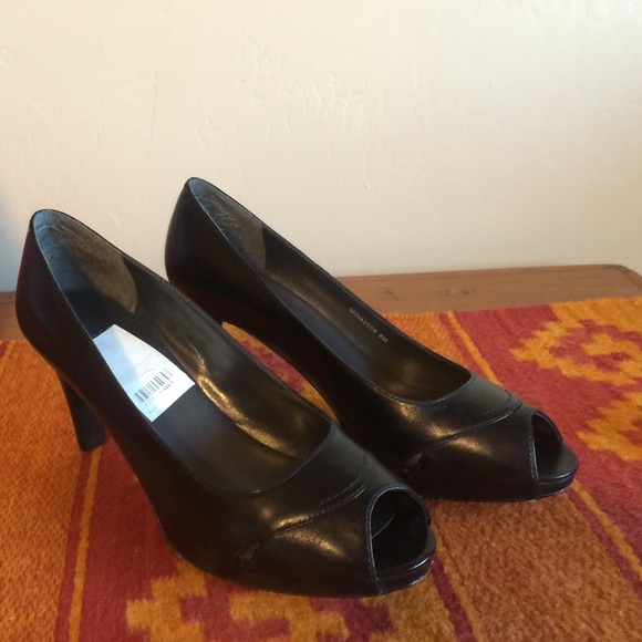 Stuart Weiztman peep toes with cut out design.