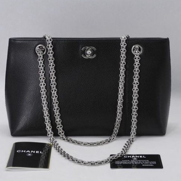Chanel silver strap bag