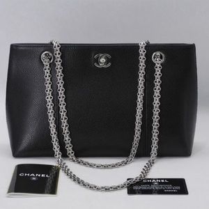 Chanel silver strap bag