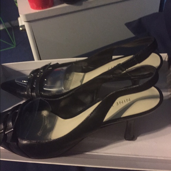 Black leather heels.