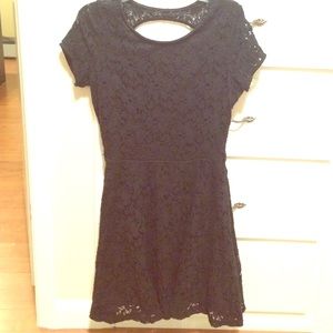 Medium-length black lace fit and flare dress