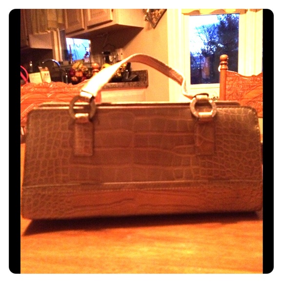 Gold, medium sized purse.