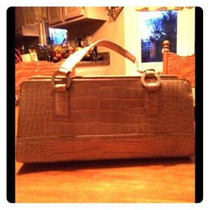 Gold, medium sized purse.