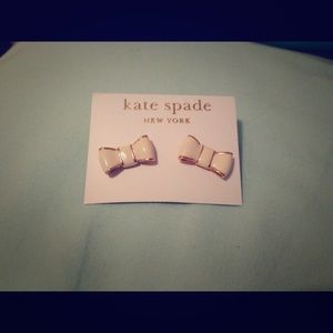 Kate spade white and gold bow earrings.