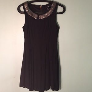 Classy little black dress with sequined collar