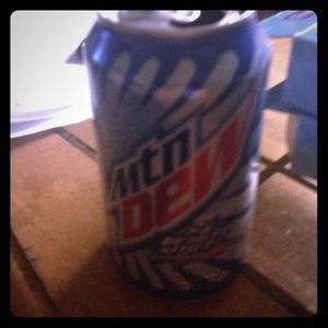 Half drunk can of soda