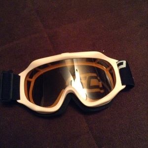 Pink and black snowboarding goggles
