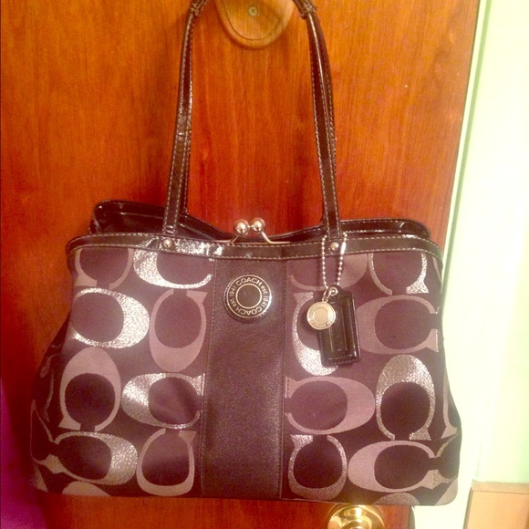 Black and silver coach purse