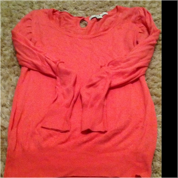coral sweater with key hole in the back