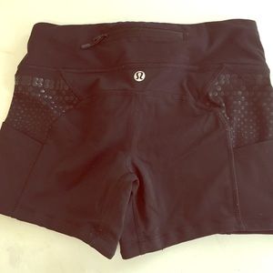 Size 4 lululemon running spandex with zip pocket
