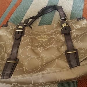 Coach purse with leather straps