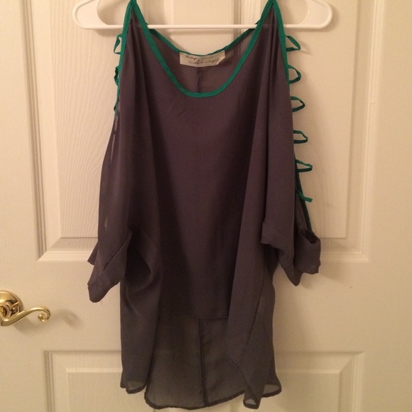 gray blouse with green accents