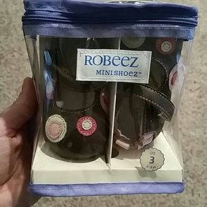 Robeez girl shoes size 3 (6-9 months)