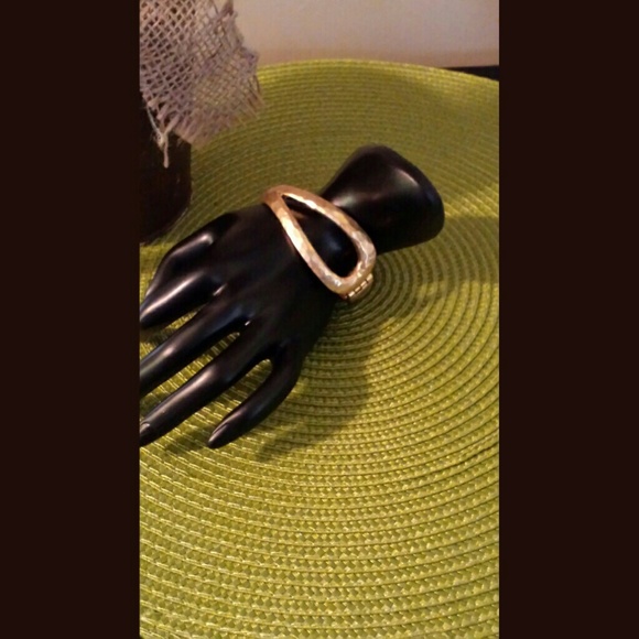 Gold hammered clasp bracelet.