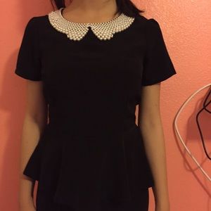 A peplum top
