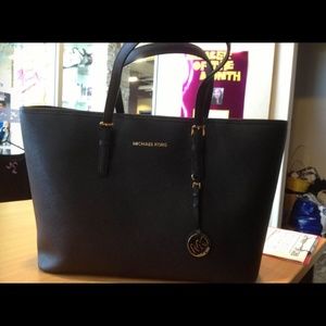 Michael Kors multifunction travel tote
