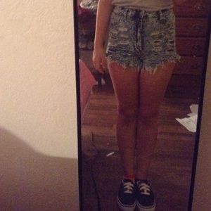 Barely worn , ripped high waisted shorts size med