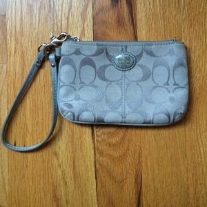 silver/ gray coach clutch