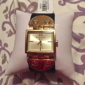NWT- Authentic Michael Kors black/gold watch.