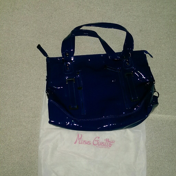 Blue patent leather handbag