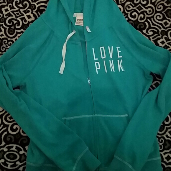 Pink sweatshirt in teal