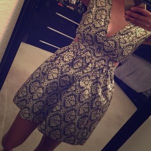 Black and gold brocade side cut out dress