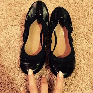 Black leather and patent leather flats