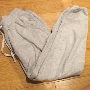 grey sweats with white draw strings