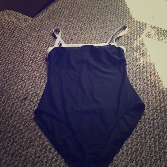 Black bathing suit with white straps