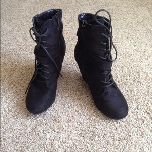 Black wedge zip booties