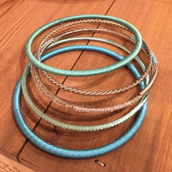 Turquoise and silver bangle stack