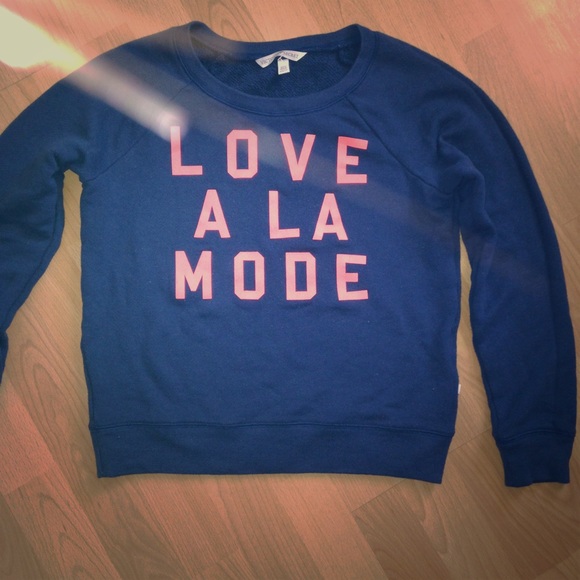 VS navy and neon orange sweatshirt