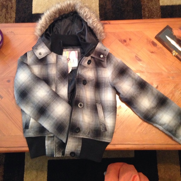 Black and white plaid coat.