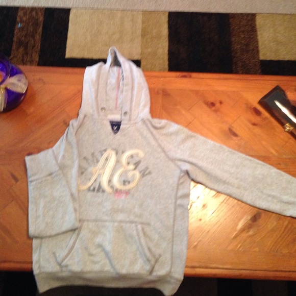 Light grey hoodie.