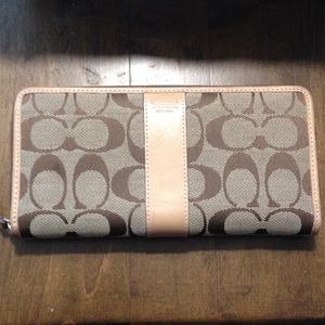 Authentic coach zip around checkbook wallet.